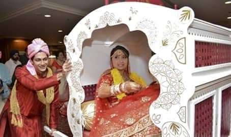 Indian wedding doli carried by family members at a South Asian ceremony in Pittsburgh PA