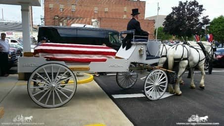 Caisson Hearse with draped casket at a funeral in Coshocton, OH