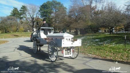 Caisson Hearse moving slowly through a funeral procession in Ohio