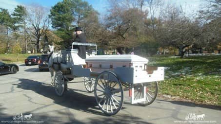 Caisson Hearse moving through a funeral procession in eastern Ohio