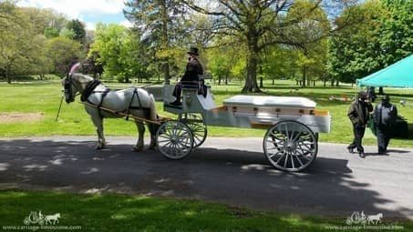 Caisson Hearse with honor guard at a funeral in Akron, OH