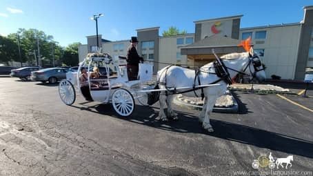 The prom couple taking a ride in the Cinderella Carriage outside of Cleveland, OH