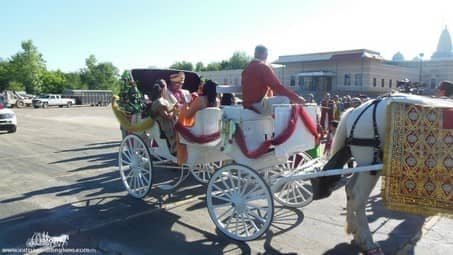 Groom and family riding to the wedding in the Indian Wedding Carriage in Brunswick, OH